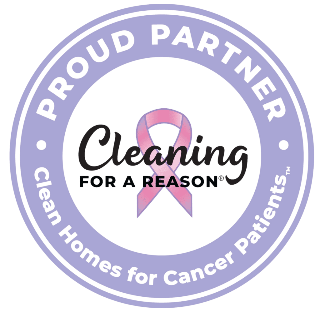 A circular logo featuring a pink ribbon in the center with the text "Cleaning for a Reason." The outer ring reads "Proud Partner" at the top and "Clean Homes for Cancer Patients" at the bottom.